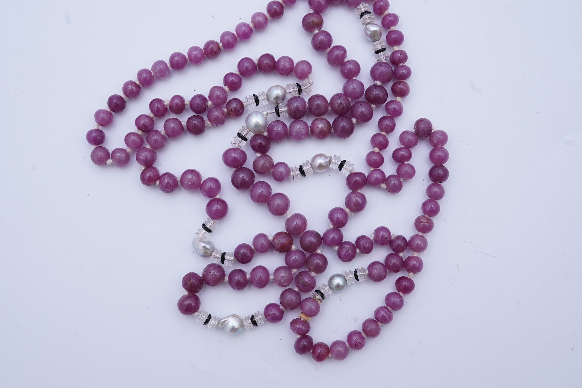 A ruby bead, onyx, rock crystal and pearl necklace